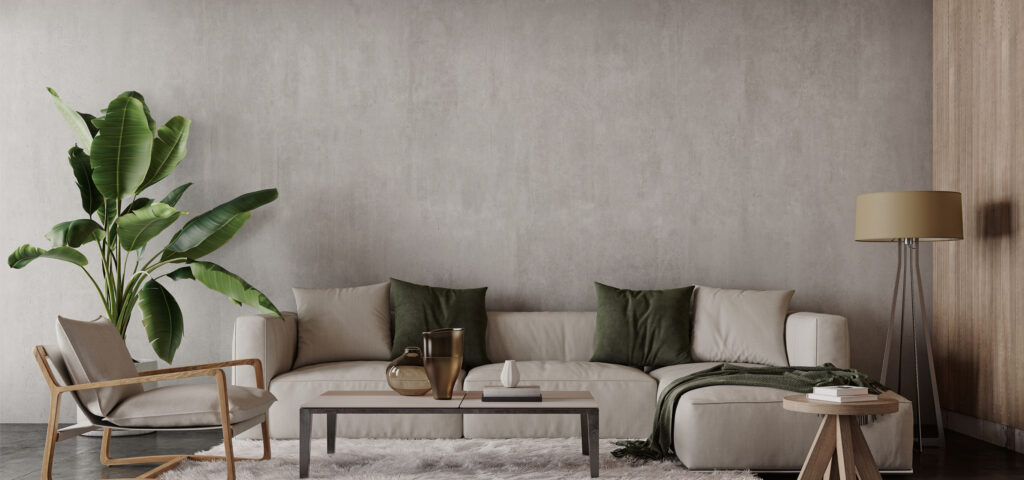 グレーの壁とソファーのモダンなリビング